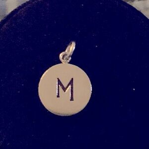 Authentic Tiffany & Co 925 sterling silver round “M” charm